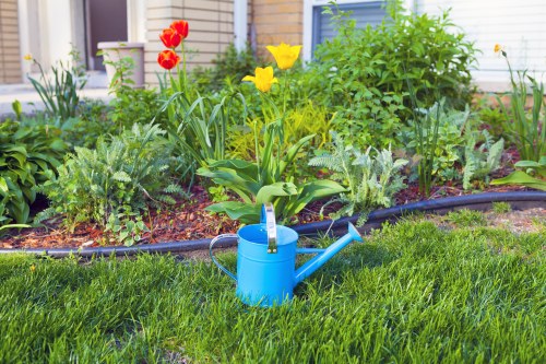 New Addington garden design featuring hard landscaping and lawn areas